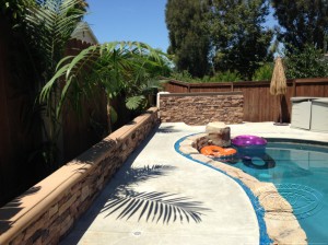 Lake Forest Poolside Retaining Wall by TRU Landscape