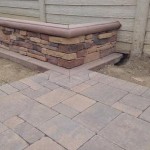 Stacked Stone Wall and Interlocking Pavers